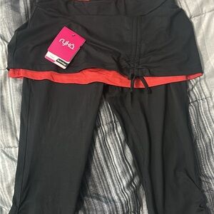 Ryka Black and Cayenne Skirted Capri Leggings